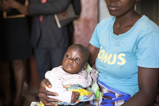 Woman holding her baby